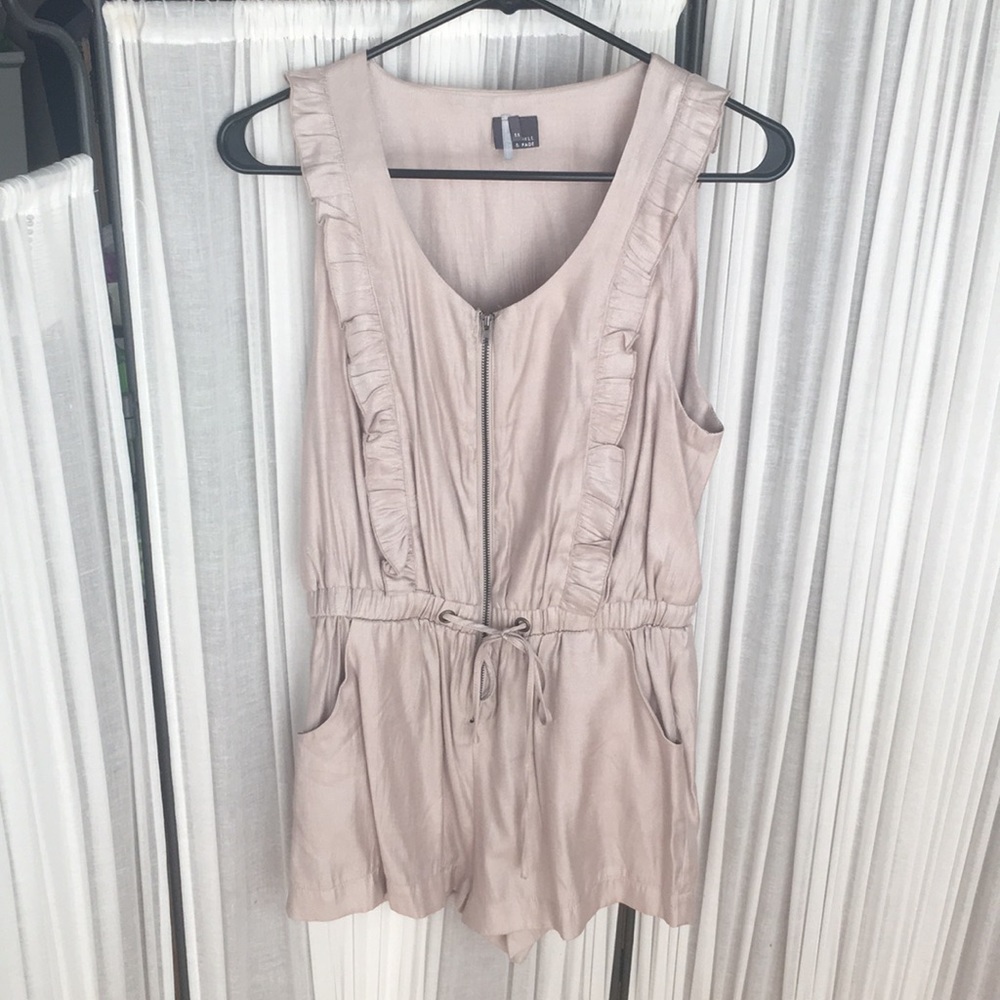 Cute zip up romper from Urban Outfitters.